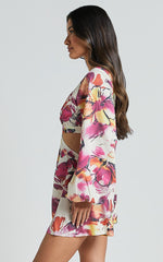 Gwyneth Playsuit - Long Sleeve Cut Out Playsuit in DAHLIA DUSK FLORAL