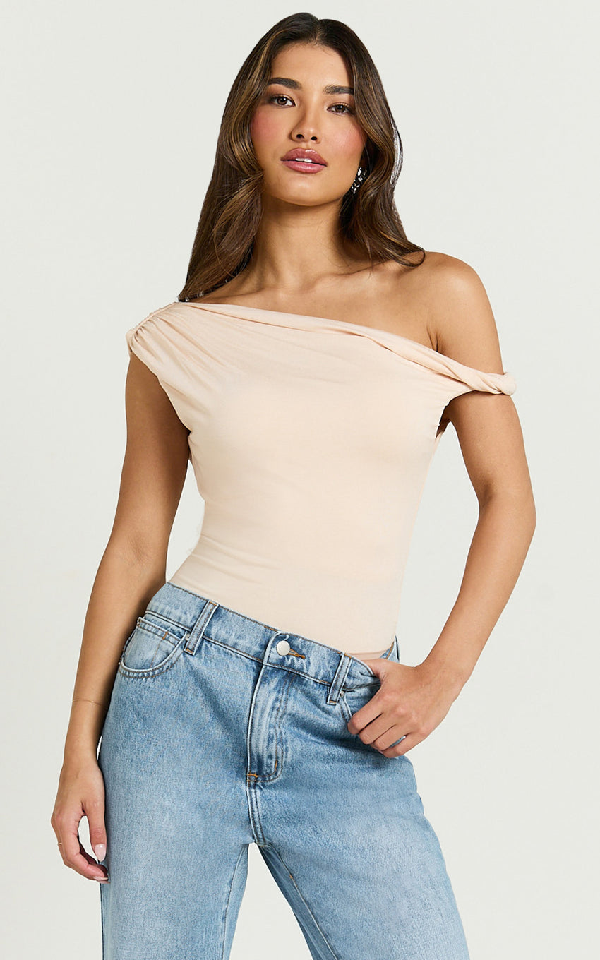 Jialeen Top - Off Shoulder Twist Asymmetrical Sleeve Top in Sand
